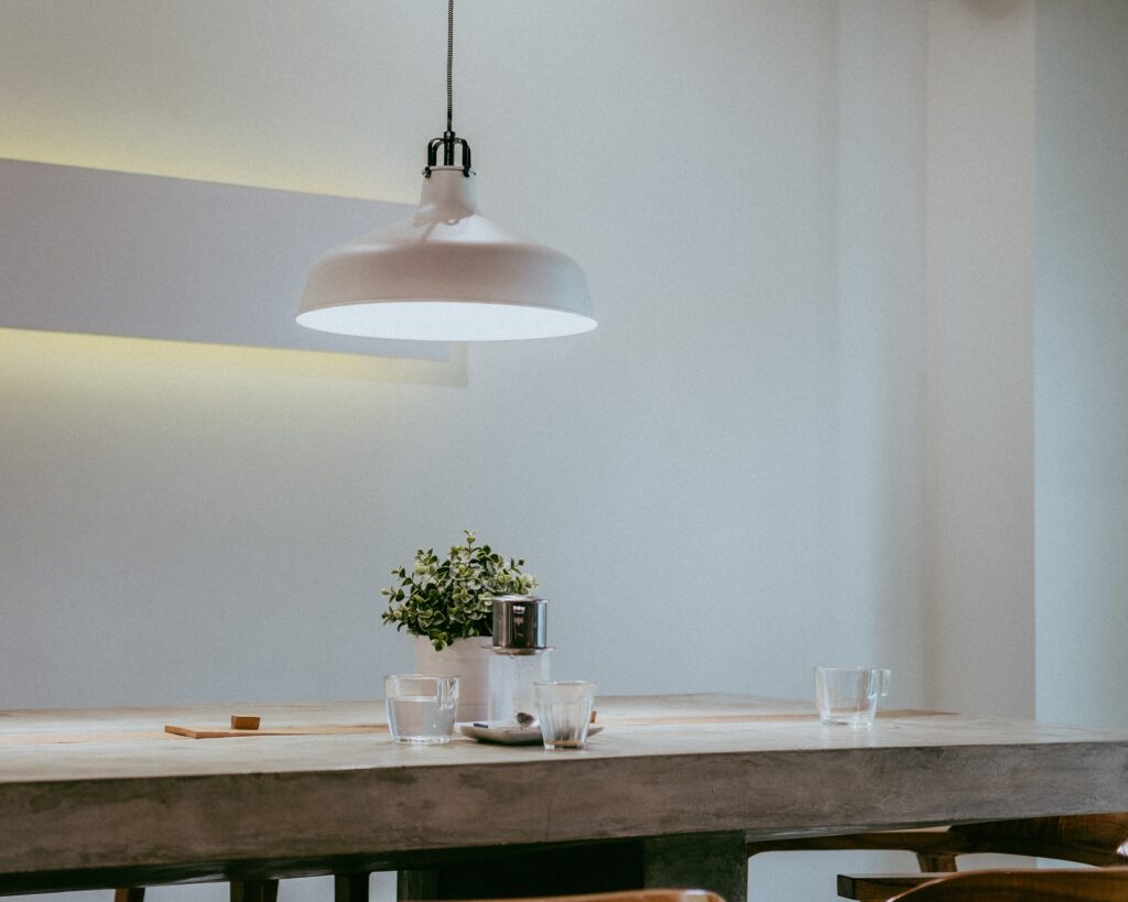 hanging light over a dining table