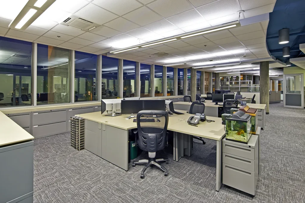 Office work stations with lighting.