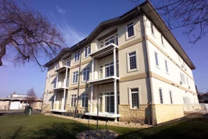 exterior of a three-story apartment building - project