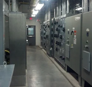 hallway filled with electrical equipment and boxes